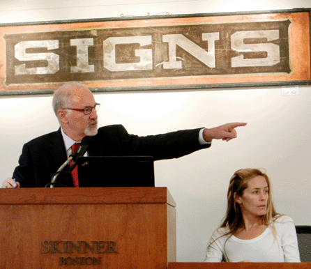 Stephen Fletcher, head of the American furniture and decorative arts at Skinner, takes a phone bid from one of the eight phones active during the sale. ⁁ntiques and The Arts Weekly photo, R. Scudder Smith.