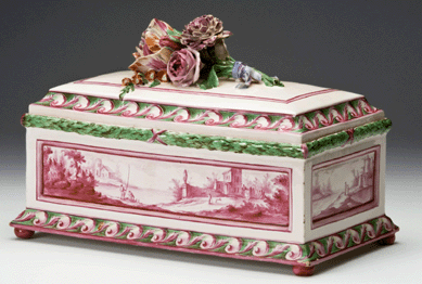 A circa 1770 covered box from the Chambrette manufactory in Luneville, France, shows the greater range of fine decoration that the lower firing temperatures of petit feu faience offered, as seen in this landscape done in a delicate pink. ₩Susan Einstein photo