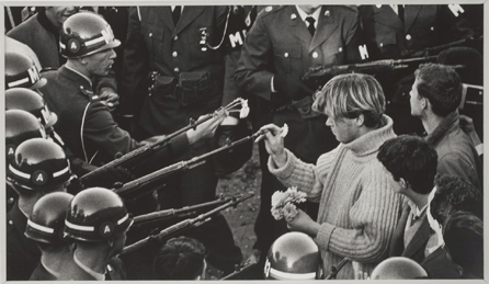 Veteran Washington Star photojournalist Bernie Boston captured a magic moment during the Vietnam war protests in 1967 when he spotted a long-haired young man who had marched with antiwar protesters to the Pentagon placing daisies in the rifle barrels of National Guardsmen confronting the protesters. The photograph titled "Flower Power†came to symbolize America's burgeoning counterculture and domestic opposition to the war. 