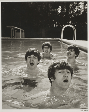 After the smashing success of their American debut on The Ed Sullivan Show, the Beatles arranged for and attracted all kinds of publicity photographs, including this playful scene in a Miami Beach pool in 1964, taken by John Loengard. The young, talented Brits helped make music a unifying force among a diverse generation of young people.