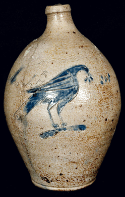 The small half-gallon jug, thought to be Manhattan or New Jersey, with the large incised and cobalt-filled bird was dated "March 17,1808.†It sold for $13,800.