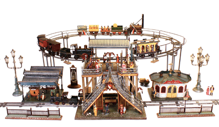A highlight of the exhibition is this Marklin elevated station with accessories, circa 1895. Note the details in the functional luggage elevator, the elegant curved double staircase, five-arm and three-arm gas lamps from 1901, a rare ticket-stamping machine and a rare Marklin no. 1501 station buffet, made in 1900.
