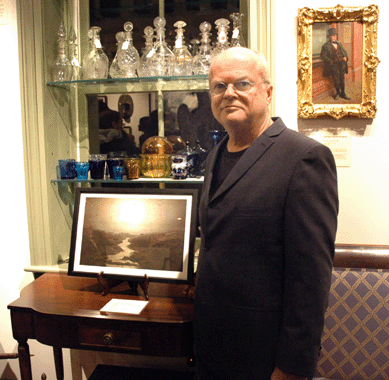 Kim Keever with one of his smaller works titled "Too Many Broken Hearts,†2000, 13 by 9 inches.