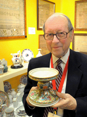Dealer Henry Callan with a rare Rose Medallion punch bowl pedestal. Henry Callan Antiques, East Sandwich, Mass.