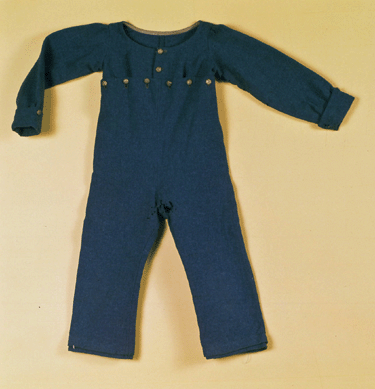 The boy's blue, wool, two-piece suit was fastened together with buttons. Such garments were called skeleton suits. A label attached to the garment reveals that it belonged to Roswell Shurtleff Jr, who died in October 1820 at four years and eight months old.
