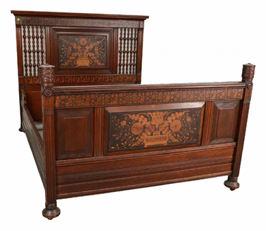 This bed was part of an Aesthetic Movement carved walnut marquetry inlaid bedroom suite attributed to Herter Brothers, which sold to a private New York collector over the phone for $22,420.