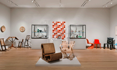 Left, a cherry wood music stand made by Wharton Esherick (1887 †1970) in 1962 is displayed in a gallery devoted to modern and contemporary American design. "IBM Disks,†a 1950s printed textile designed and produced by Angelo Testa (1921 †1984). The fabric was a gift to the museum in honor of textiles authority Florence M. Montgomery in 2006. ⁅lizabeth Felicella photo, 2012