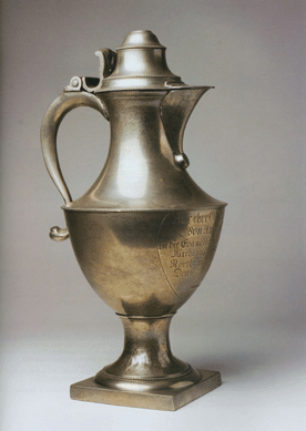 Originally a pewter dealer, Charles Montgomery added a number of great examples to Yale's already outstanding pewter holdings. He included a William Will urn-shaped coffee pot from a private collection in the 1976 show "Toward Independence.†Patricia Kane and former Yale curator David Barquist, now at the Philadelphia Museum of Art, tried to acquire the coffee pot for Yale when it later came up at auction. Kane had better luck when this William Will pewter flagon of 1795 surfaced in 2007. Yale University Art Gallery, The Dobson Foundation; Friends of American Arts Acquisition Fund; Mr and Mrs Frank J. Coyle, LLB 1943, Fund, Peter B. Cooper, BA 1960, LLB 1964, MUS 1965, and Field C. McIntyre American Decorative Arts Acquisition Fund; Friends of American Arts Decorative Arts Acquisitions Fund; and Lisa Koenigsberg, MA 1981, M.Phil. 1984, PhD 1987, and David Becker, BA 1979 Fund, 2007.214.1.