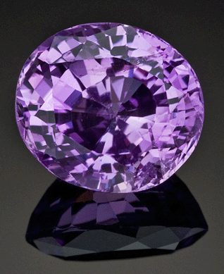 A rare and large purple-pink sapphire from Sri Lanka, weighing approximately 28.98 carats, achieved $116,500.