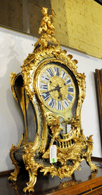 A Louis XV ormolu and boulle marquetry bracket clock brought $20,400.