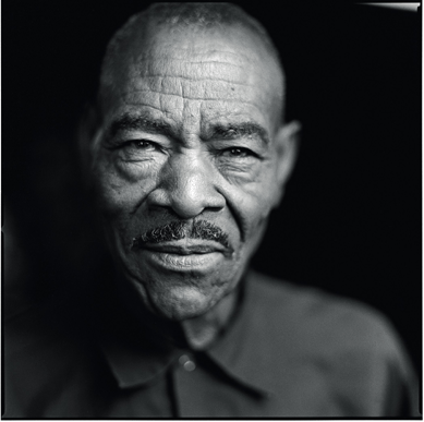 This 2002 photograph by David Raccuglia captures the intensity and humanity of self-taught artist Thornton Dial at age 74. Courtesy High Museum of Art.