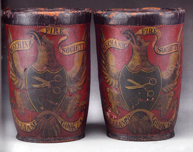 The rare pair of red leather fire buckets did well at $36,800.