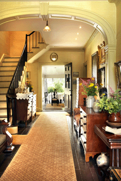 A view of the center hallway restored to the time period when Florence Griswold accepted artist boarders.