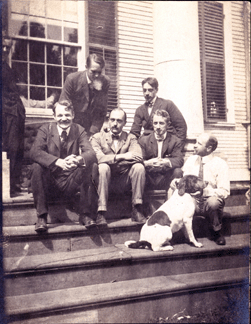 The front porch of the Griswold House was a frequent gathering place for artists. Pictured in this circa 1903 photograph, “Artists on front steps,” are, from left, bottom step: Frank Vincent DuMond, Clark Voorhees, Arthur Heming, Will Howe Foote, and a dog; top step: Gifford Beal and Harry Hoff-man. Florence Griswold Museum.