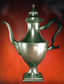 This graceful urn-shaped Federal coffee pot by William Will of Philadelphia is the Wolfs' favorite piece of American pewter. Beaded and engraved, it was reputedly given by Thomas Jefferson to Margarita Schuyler on her engagement to Stephen Van Rennselaer.