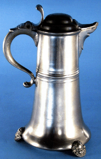 This flagon by Johann Heyne of Lancaster, Penn., holds the record price at auction for American pewter. The Wolfs purchased the late Eighteenth Century vessel with cherub's head feet at Sotheby's in 1998 for $145,500. 