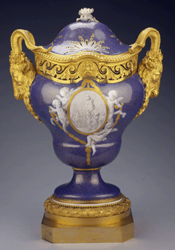 Sèvres vase, circa 1769–1770. Soft paste porcelain and bronze gilt; 17 ¾ by 9 ½ by 7 ¼ inches. Musée du Louvre. From Decorative Arts of The Kings.”