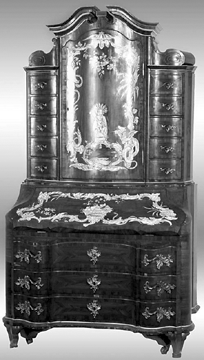 The Nineteenth Century rosewood secretary desk had ivory inlay of flamboyant dragons, snakes and fruit and sold for $31,625. 
