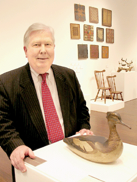 Dean Failey with the Lothrop Holmes red-breasted decoy sold by Christie's in January 2007 for $856,000 ($400/600,000), an auction record for an American decoy.