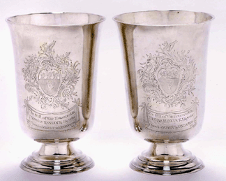 Silver Communion cups, 1764, Nathaniel Hurd (1729‱777). Patriot John Hancock had close family ties to Lexington. His uncle, Thomas Hancock, was the son of the minister who preceded Jonas Clarke, minister at the time of the battle. Thomas gave these silver beakers to the Lexington church in 1764.