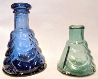 The cobalt-colored cone ink with a draped pattern, left, sold for $5,750, while the smaller version in a light medium green color brought $1,265.