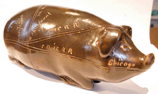 The Anna Pottery railroad flask realized $5,462.