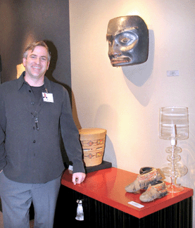 Westboro, Mass., dealer Ned Jalbert with a circa 1840‵0 Northwest Coast Nishga mask deaccessioned by the Heye Foundation in the 1960s.