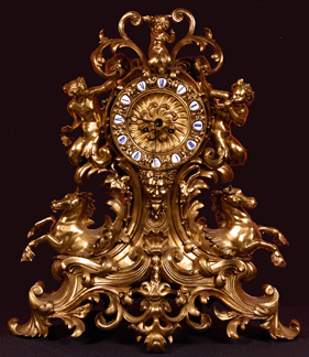 Marked "Denier a Paris,†the Nineteenth Century French gilt bronze mantel clock sold for $6,325.