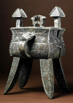There was applause when this important and rare archaic bronze wine vessel and cover (fangjia), late Shang dynasty, Thirteenth⁅leventh Century BC, from the Albright-Knox Art Gallery in Buffalo, N.Y., sold for a remarkable $8,104,000. The vessel,  which set a new record for Chinese art at Sotheby's New York, was purchased by UK dealer Roger Keverne on behalf of Compton Verney, a museum outside Stratford-upon-Avon, England. 