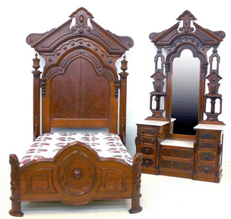 An American walnut renaissance revival bed and dresser with a drop marble top was signed by Mitchell and Rammelsberg of Cincinnati and sold for $7,975.