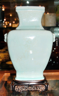 A creamy lavender green Ju type vase with the six-character Ch'ien Lung seal mark sold for $21,150.