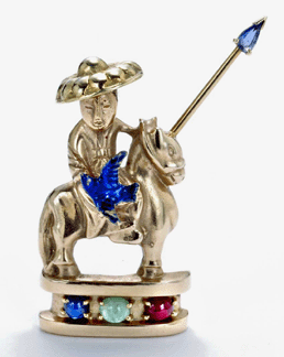 Oriental knight, circa 1950, gold, sapphire, emerald and ruby.