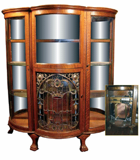 Regina musical china cabinet, one of only 13 made. Only two, like this one, were made in quarter-sawn oak. It sold for $60,500.