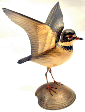 A life-sized semipalmated plover decorative carving by Crowell was the top lot of the auction, selling at $51,750.