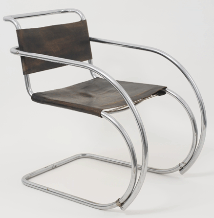 About 1931, while serving as Bauhaus director, architect Ludwig Mies van der Rohe designed this inviting, curvilinear armchair. Private collection. Courtesy Neue Galerie New York. ⁊effrey Sturges photo, ©2009 Artists Rights Society (ARS), New York / VG Bild-Kunst, Bonn