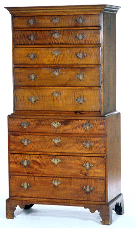 This chest-on-chest, circa 1790‱810, is attributed to Solomon Sibley (1769‱856) of Ward (now Auburn). The chest speaks to the maker's potential for skill with an elegant bracket case, but the simplicity of the upper and lower cases indicate that Sibley was not able to hone his skills with year-round cabinetmaking. Many of New England's early furniture makers were farmers, which occupied them much of the year.