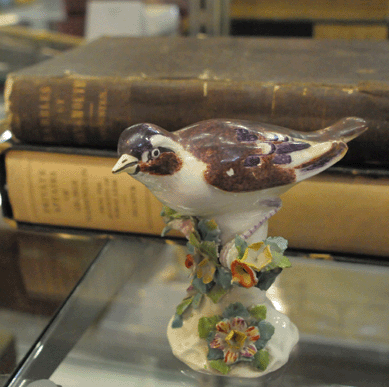 A late Eighteenth Century porcelain figurine of a bird was something of a mystery, although sleuthing by James Julia and his crew of astute researchers soon solved the puzzle. From a group of three figurines presented by George and Martha Washington to Colonel Lear, only the bird proved to be of the correct period, contrary to the beliefs of the consignors. It was discovered that a family member had long ago given two of the figurines to Mount Vernon and replaced them with later Staffordshire figures. The single porcelain bird figurine attracted a great deal of attention, selling at $6,325.