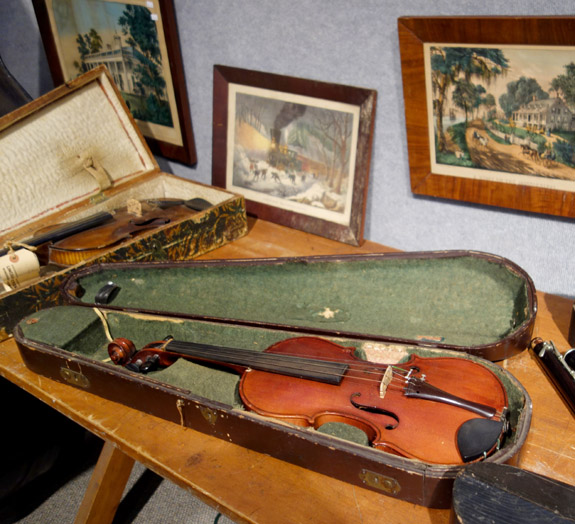 One of several violins in the sale, this one bringing $ 862.