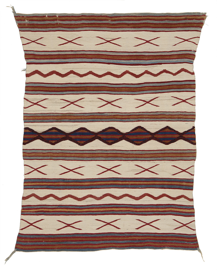 Serape-style blanket, Diné (Navajo), 1865–1875; weft-faced plain weave or tapestry weave; handspun wool warp, handspun natural white, indigo-dyed blue, vegetal-dyed gold and raveled red bayeta weft. Durango Collection, Center of Southwest Studies, Fort Lewis College, Durango, Colo.