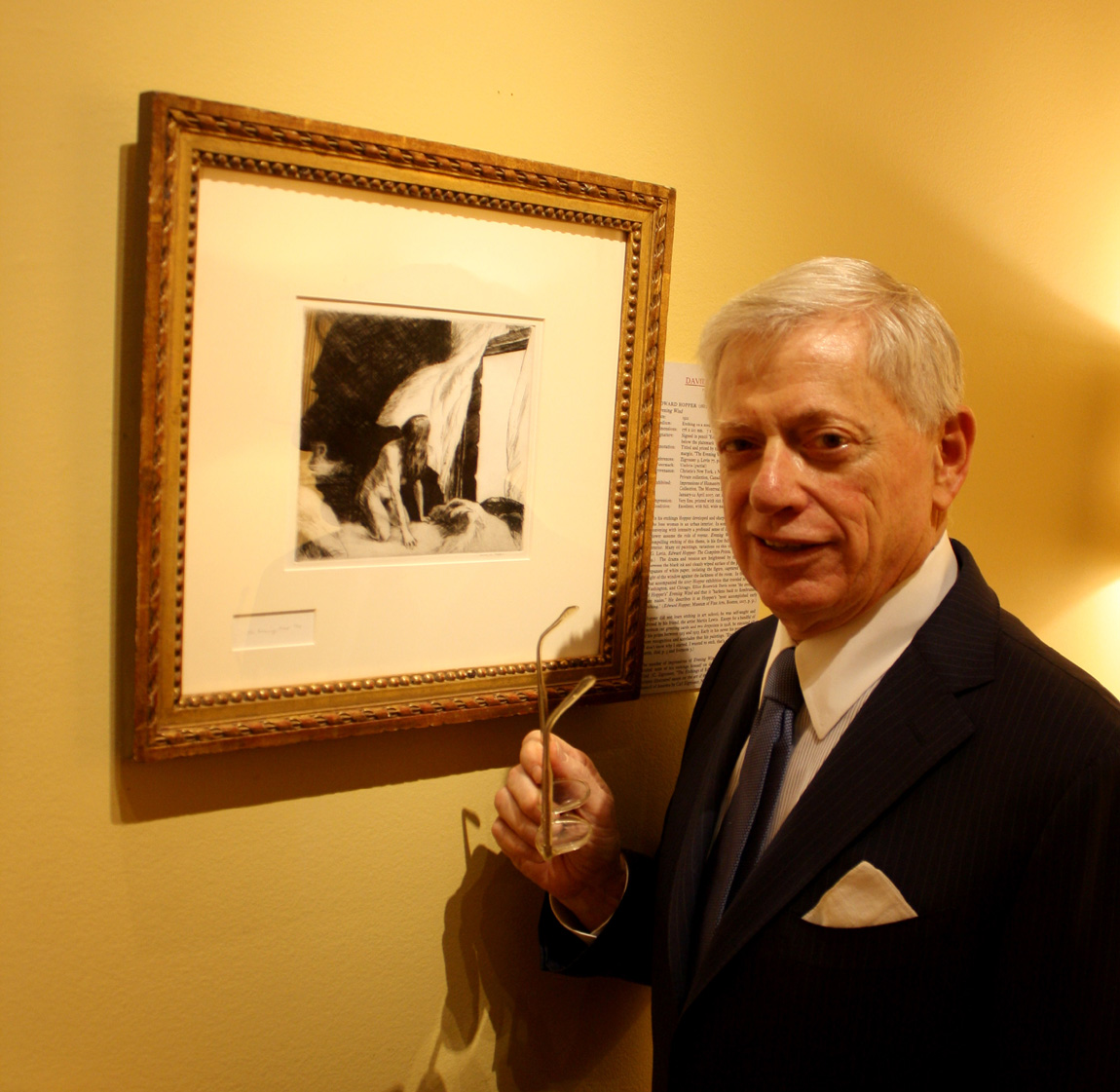 David Tunick with Edward Hopper’s 1921 etching “Evening Wind.”