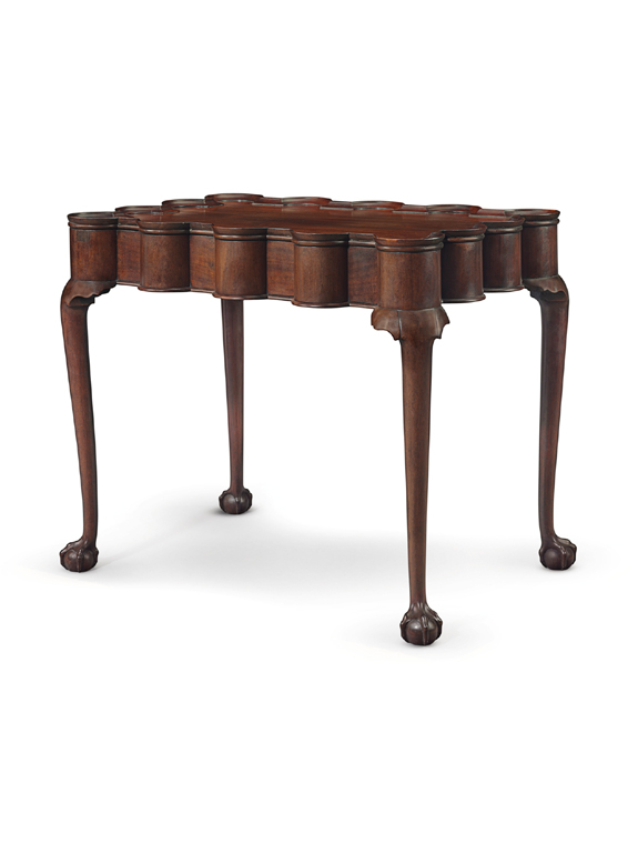 Retailed by John Walton, Inc, in 1953, and consigned by the Rosebrook Collection, this Chippendale turret-top mahogany tea table, Boston, 1750-60, sold for<br>$ 485,000 ($ 300/0,000). Christie's Various Owners Sale.