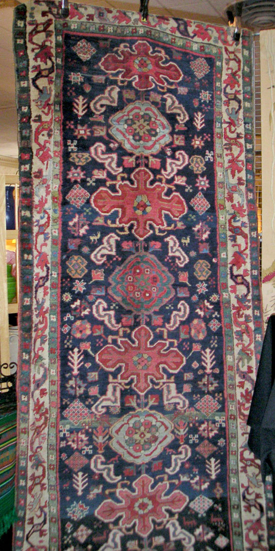 Peter Piper Antiques, Arlington, Va., showed this antique Kashan rug from 1880 that was an unusual 42 inches wide by 12½ feet in length. It was in very good condition, and the all original natural dyes were still richly colored with no signs of fading.