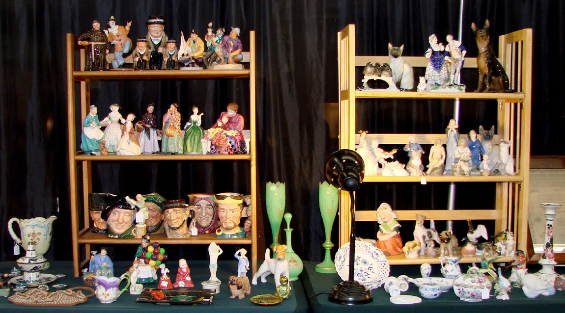 Noble Peddler Antiques, Torrington, Conn., displayed several Royal Doulton character jugs, most priced under $ 100, along with other Royal Doulton figures.