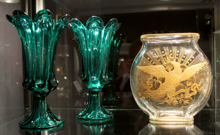 Ian Simmonds, Carlisle, Penn., offered a more historical take on glass with what was probably specially commissioned from Baccarat, Paris — a vase with gold-paste decorated American eagle, circa 1878–1890, shown right, and a rare pair of New England Glass or Sandwich loop pattern vases in rich emerald green, circa 1840–60.