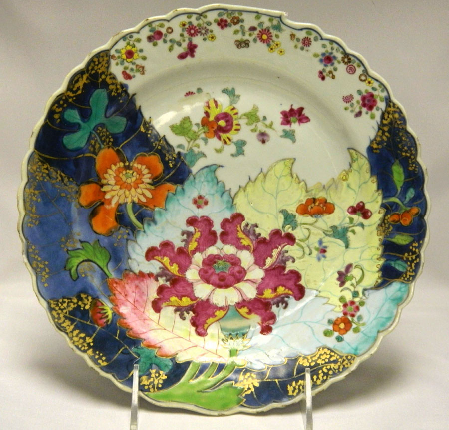 Maria & Peter Warren Antiques, Wilton, Conn., brought a Chinese export 9¼-inch plate decorated with underglaze blue polychrome enamels and with a gold edge on the lobber rim. The floral sprays are most likely hibiscus and passion flowers in this pattern popularly known as Tobacco Leaf, Qianlong, circa 1775–85.