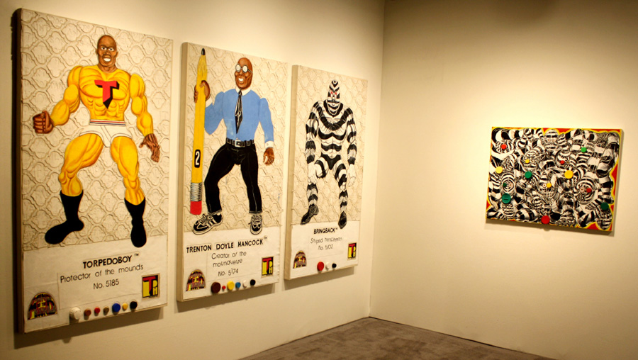 Black superhero paintings by Trenton Doyle Hancock<br>at the booth of James Cohan, New York City.