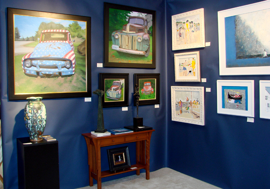 Gleason Fine Art, Boothbay Harbor, Maine, displayed paintings by<br>Kevin Beers depicting vintage pickup trucks and bronzes by Roy Carbone,<br>along with contemporary ceramics.