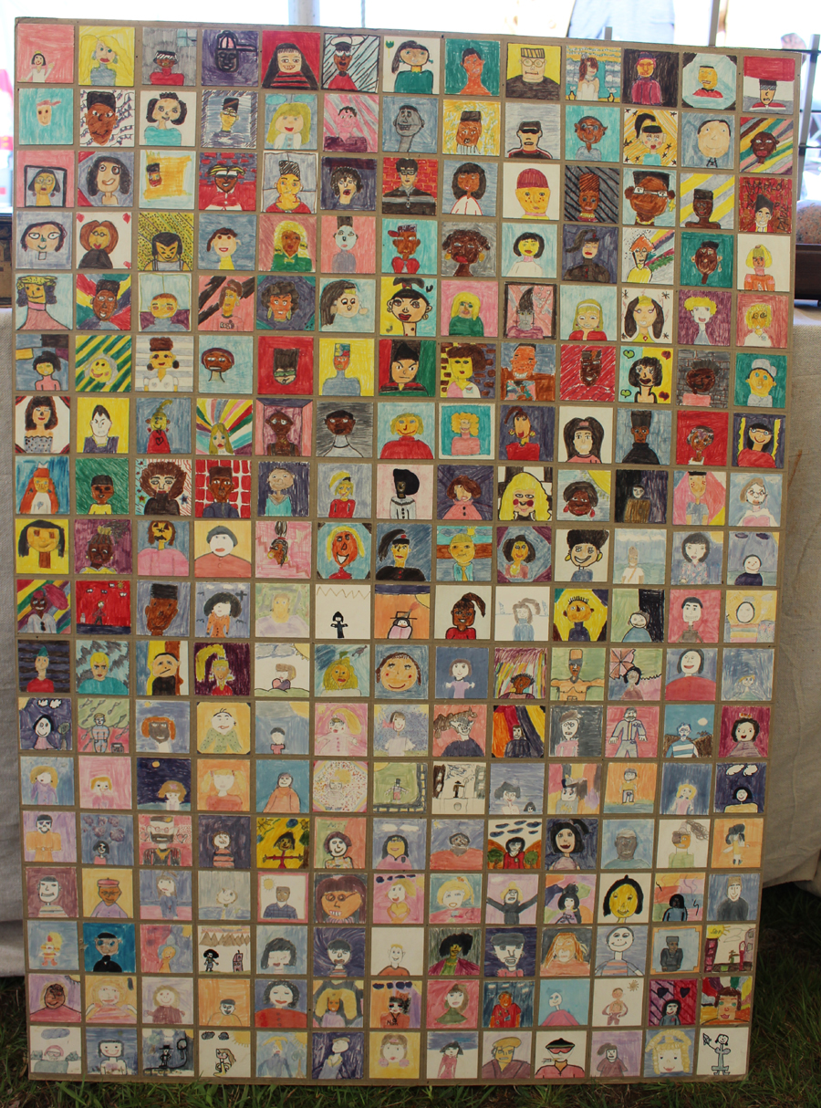 Corey Daniels, Wells, Maine, was showing a collection of 12 panels created by The Gorgeous Mosaic, a project carried out by the classroom art teachers of the world in which students individually draw portraits of the many different types of youngsters there are in their world on small cardboard tiles. The completed tiles are mounted on panels for exhibition. —Heart-O-The Mart