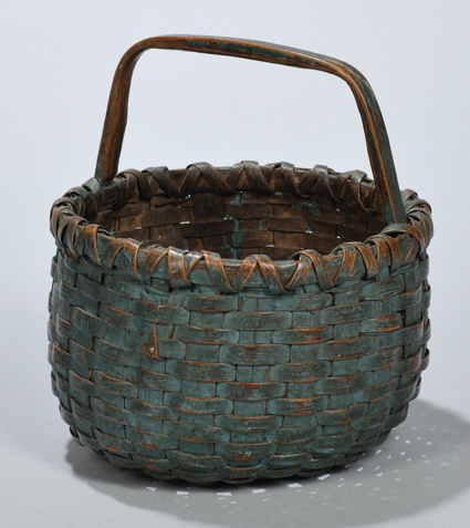 The delectable blue color of this 7-inch-high splint basket<br>helped push its price to $ 7,500.