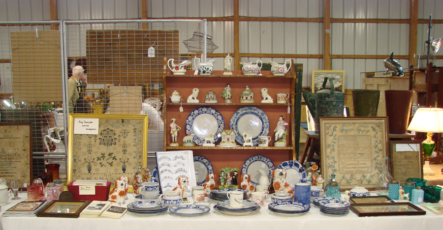 In addition to Dedham pottery, Henry Callan, East Sandwich, Mass., always has a selection of samplers as well as Chinese Export porcelains.